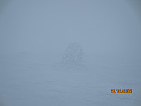 Toppvarden på Nørdre Gråhøgda dekt av snø