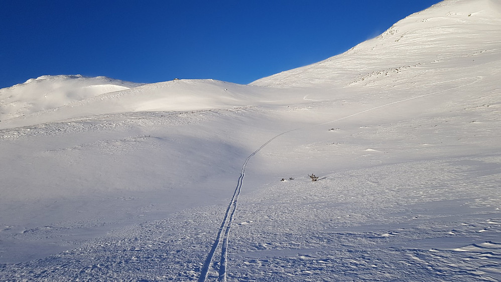 Tilbakeblikk i det jeg kom ned på flata mellom toppene