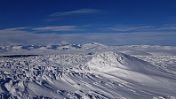 Mot Snøhetta hvor det var noen skyer i bakgrunnen