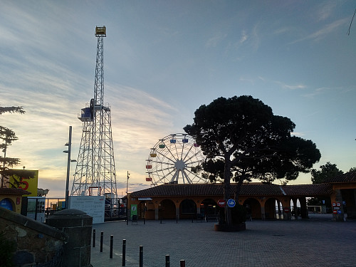 Just beside the Church located at the summit of Tibidabo, there's an amusement park with a Ferris wheel and a roller coaster, among other things.