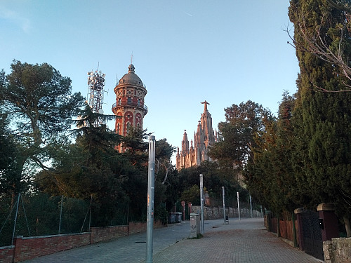 At the very summit of Mount Tibidabo is located a huge Church, with a huge Jesus on top, preventing you from reaching the summit proper, unless you want to enter the Church.