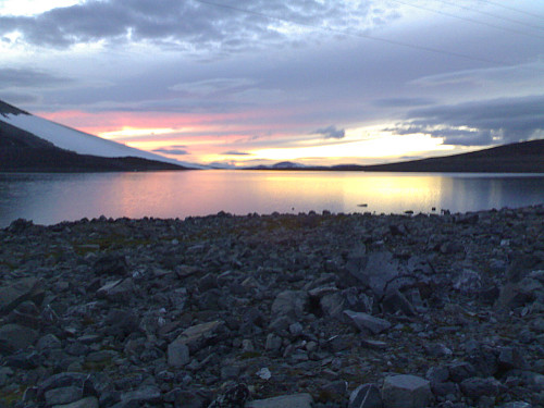 Image 3: The lake Juvvatnet shortly before sunset. Hotel "Juvvasshytta", where we spent the nights and the evenings while at Galdhøpiggen and Galdhøpiggen summer ski centre is located just beside the eastern shore of the lake.