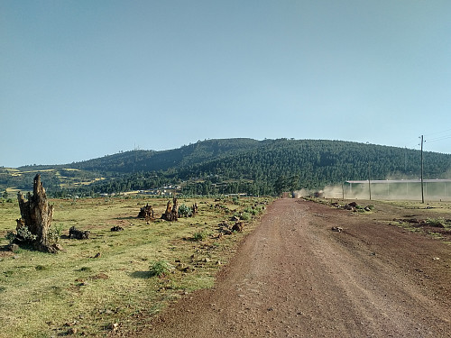 #3: Setting out for Mount Furi. The summit is the peak to the left, i.e. the one with five huge antennas.