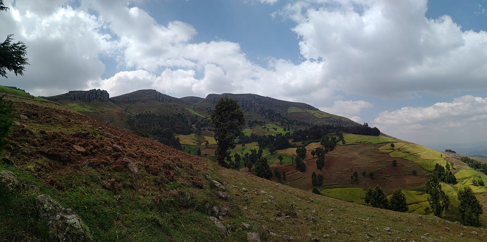 #1: Climbing Wochecha from the northeast. This image shows a beautiful agricultural landscape with barley fields up to about 3200 m.a.s.l., and then just pastureland above that altitude.