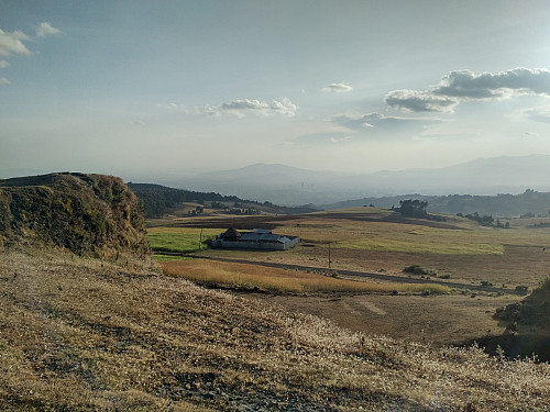 #15: View from Entoto. I captured this image standing only about 500 meters from the summit. The mountains in the background are the Gara Furi Terara (in the middle) and the Wochecha (to the right).