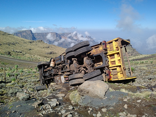 #12: An unfortunate vehicle that we encountered on our way from Chennek to Ras Bwahit. As a lorry owner I really felt sorry for this poor truck. The mountains in the background are (from left to right) Enatye, Shayno Sefer and Imet Gogo.