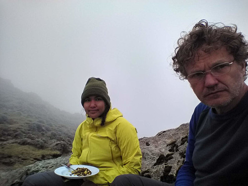 #55: Lunch time in the notch between Abba Yared and Mount Silki, at about 4150 m.a.m.s.l. I had a pair of glasses on, in order to have a look at our map.