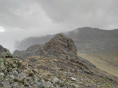 #57: The east peak of Mount Silki, as seen from the summit of the mountain. Mount Abba Yared is seen in the background.