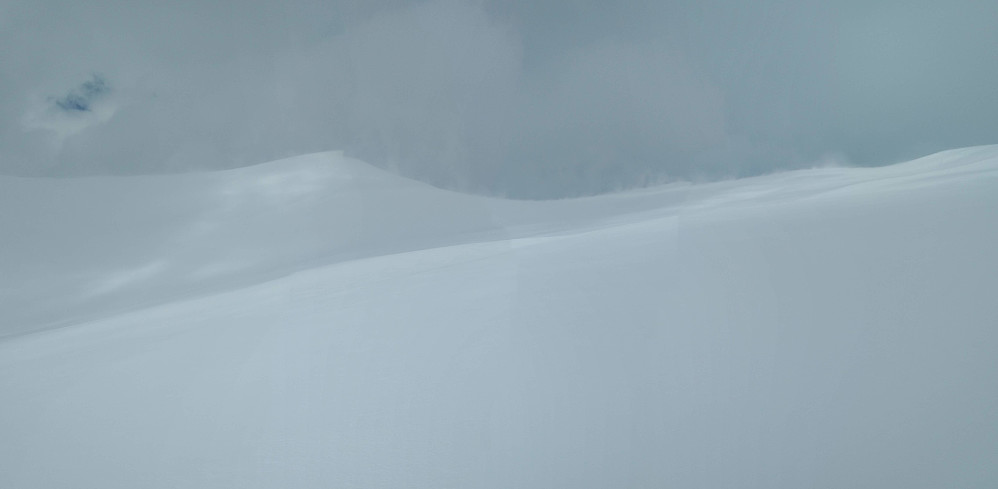 #13: To begin with weather was quite cloudy, and strong winds that were whirling up snow were contributing to poor visibility.