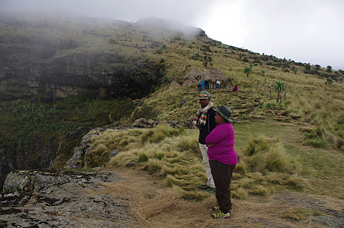 #14: My wife and Tadlo at the site of the Church Cave, about 3820 m.a.m.s.l. These two images were captured the next day, when my wife came along with us to the site [i.e. after I, Tadlo and the ranger had visited the summit of Bwahit]. The summit area of Meche Awoknesh is seen in the background.