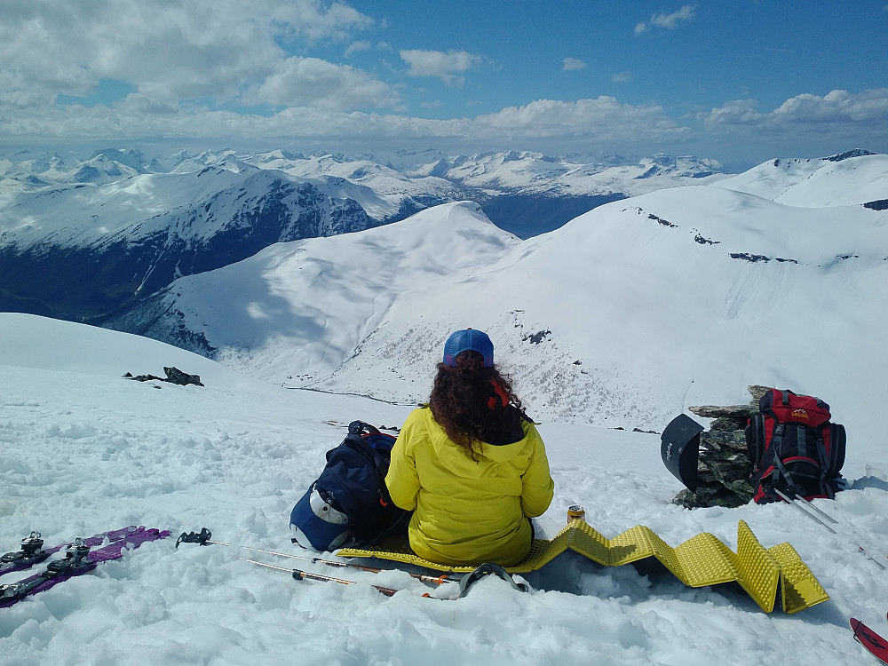 #10: On the summit of Mount Auskjeret. In the distance lake Nysetervatnet may be seen, along with the cabin village of Orreneset and Fjellsetra Ski Arena in Sykkylven municipality.