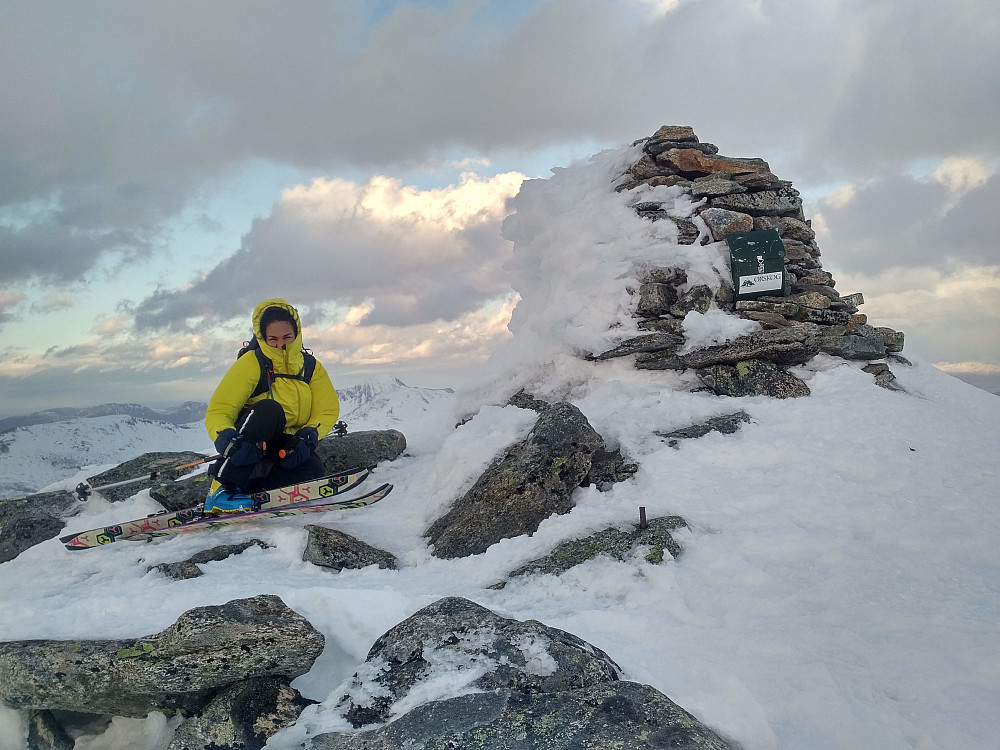 #7: At the summit of Mount Høgsvora. It was blowing quite a bit up there. The observant eye will notice Mount Sandtinden (1069 m.a.m.s.l.) and Mount Ytstetinden (1162 m.a.m.s.l.) in the background; the former in front of the latter.