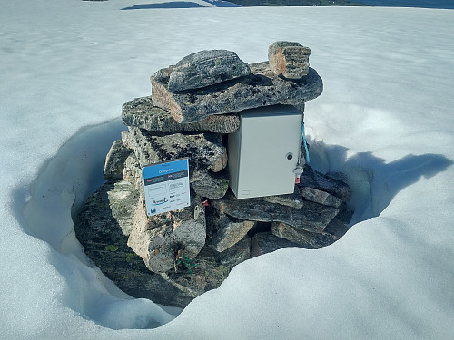#5: The cairn on top of Mount Oterfjellet. If you want to register your ascent, you can either write your name in the book that you find in the mailbox. The book is currently not there, however; as it has been removed to prevent spread of Covid-19.