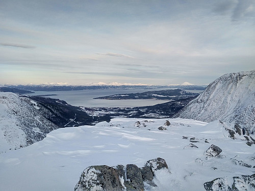 #6: View from Mount Litleskjerdingen towards Fixdalen valley, the fjord Romsdalsfjord, and the town of Molde (on the other side of the fjord. Part of Mount Melen is seen to the right, and part of Mount Storeskjerdingen to the left.