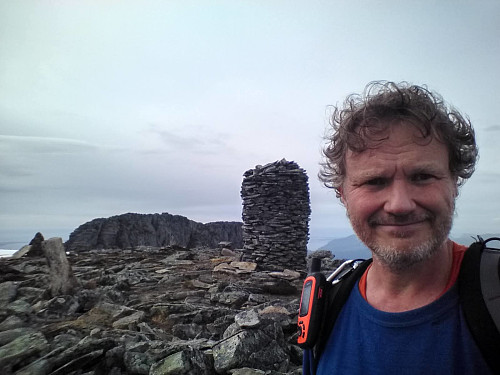 #16: On the south summit (1061 m.a.m.s.l.) of Mount Blåskjerdingen, with the huge cairn on top. The north peak (1069 m.a.m.s.l.) is seen in the background.