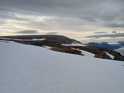 #28: On my way up Mount Rekdalshesten. The island Oterøya is seen in the background in the right part of the image. As I was ascending this mountain, I was heading towards the knoll of the Mountain called Hestenebba (758 m.a.m.s.l.), as this spot offers the best view over the valley Rekdal.