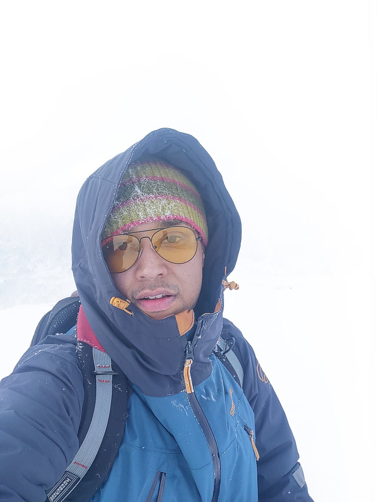 #9: A "selfie" that my son took of himself, showing almost complete "whiteout" of the surroundings, due to snowy and cloudy weather.