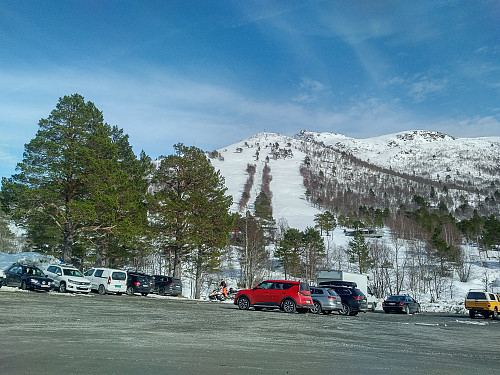 #1: At Skorgedalen parking lot. The peak called Nyseterskarven (790 m.a.m.s.l.) is seen above and behind the ski slopes of Rauma Skisenter.