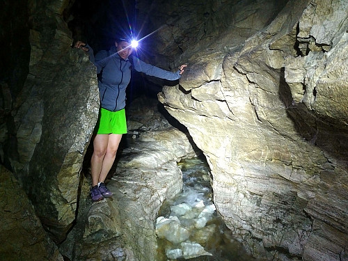 Image #8: My daughter is trying to get further into the cave without getting her feet and her shoes wet.