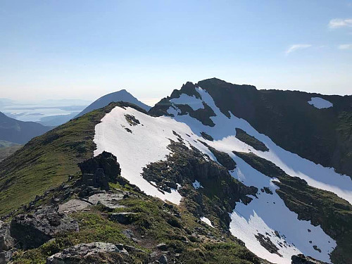 Image #35: Looking back at the Troll Peaks that we have just traversed. There was still a bit of snow on the northern side of the ridge, where sunshine is less abundant than it is on the mountain side facing south. In the background Mount Talstadhesten is seen.