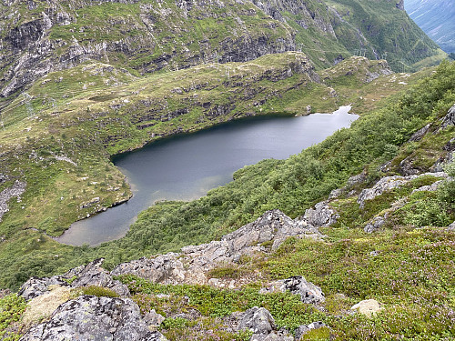 Image #15: A view of the lake from high up the south east ridge of Mount Svartebottstinden. In the lower part of the ridge, I was so focused on climbing, that I forgot all about shooting pictures. At this point, however, I had passed the most challenging part of the climb.
