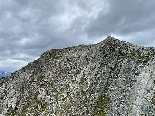 Image #18: The summit of Mount Svartebottstinden as seen from the southeast ridge. There's a gorge between the summit and the site from which this image was shot.