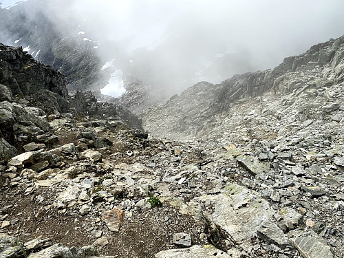 Image #14: While I was on my way up a chute towards the summit of The King, fog started coming up from the valley called Haugabotnen, a valley on the west side of this mountain range.