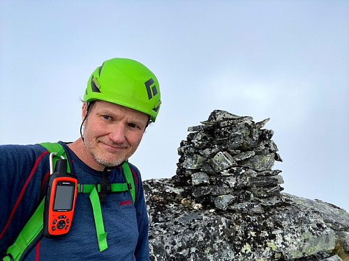 Image #25: On the summit, or main peak of The Queen. In bright weather you have a wonderful view from this mountain, and a number of other renown peaks such as Trollryggen and Store Trolltind would have been visible behind me.