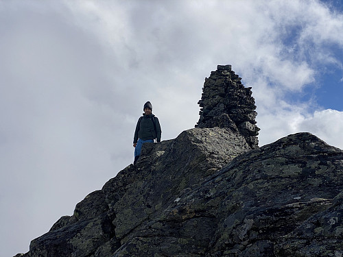 Image #10: By the cairn on top of the mountain.