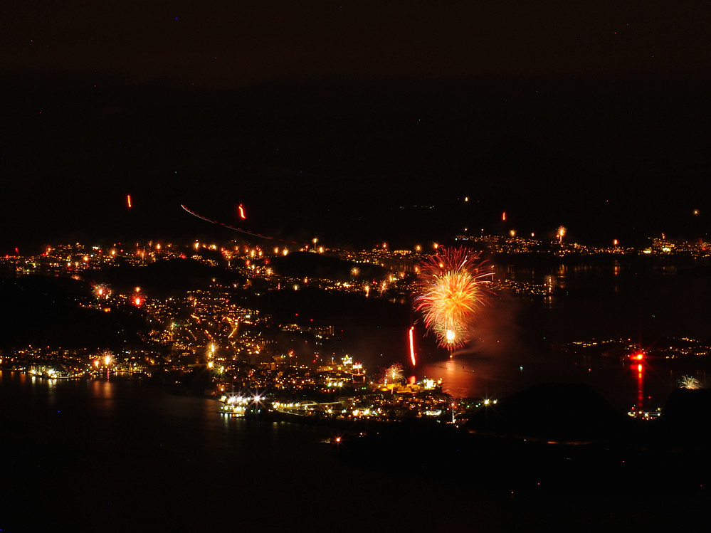 Image #1: I'm not really into the Christian New Year celebration, but I have to admit they do make spectacular fireworks; and Mount Storhornet on Godøy Island is a perfect spot for long exposure photography of the town of Ålesund on such a night. For this image I used ISO 200, f22 and 30" on my Pentax K5-IIs, which had an SMC 50 mm Pentax-AF lens mounted. I would have preferred to use even longer exposure time, in order to get more fireworks into the image; but 30 seconds is the maximally allowed exposure time on this camera, so I would have to have a remote control in order to make the exposure time even longer. And then, even if I did have a remote control, the bright moonlight this night would have prevented me from making the exposure time longer; as the image would then have become too bright.