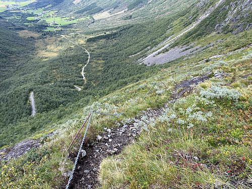 Image #2: The climb up from Dalskleiva Parking Lot up to the plateau where lake Kleivavatnet is located is quite steep. Nevertheless, there's a good trail, at places with rails or a rope to hold on to. The road up to the parking lot is visible in the background.