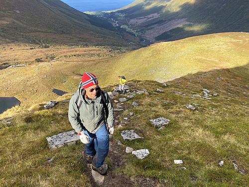 Image #10: From our climb up the first part of the ridge towards the summit of Mount Middagshornet. The village of Barstadvika is seen in the background.