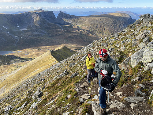 Image #12: On the last part of our climb towards the summit of Mount Middagshornet. Mount Klovetinden, which we climbed earlier on this day, is the peak just to the right of the huge mountain cleft seen in the background.