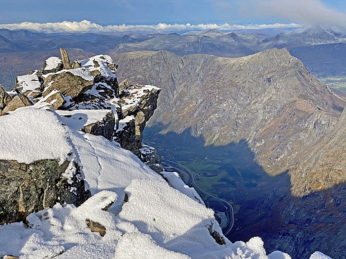 Image #13: View from the summit of Mount Breitinden towards the Romsdalseggen Mounain Range. The river in the valley is the Rauma River. Winter is now approaching, and so the valley is in the shadow most of the day.