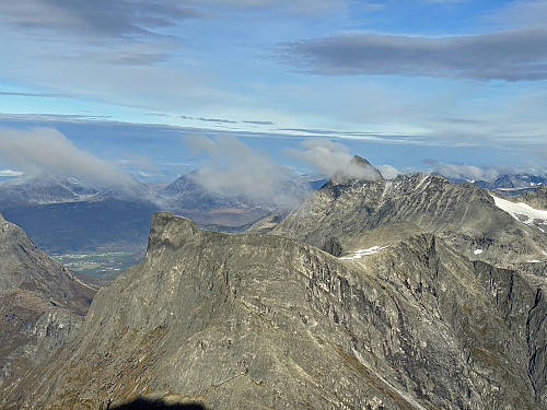Image #14: The view of Mount Romsdalshornet, Mount Lillehornet, Mount Hornaksla, and Mount Olaskartinden; and behind them Mount Store Venjetinden barely visible behind Mount Lille Venjetinden.