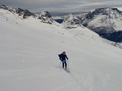 Image #10: A bit higher up in the route up to the top of Mount Alnestinden. Mount Bispen and Mount Kongen are seen in the background.