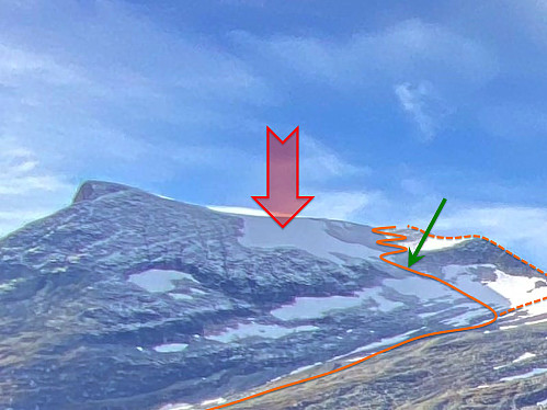 Image #15: An image of Mount Alnestinden as seen from Stigebotnen Valley on October 10th. The orange line indicates the commonly used route up to the summit of Mount Alnestinden, and the dotted line in the right part of the image indicates an alternative route that may be used as long as there's no ice shelf along the ridge up there. The red arrow points at a huge snow patch from last winter season that was still there. The area of this snow patch corresponds to the area of the avalanche that took place a little less than two weeks later. The green arrow marks a spot at which I personally triggered an avalanche on December 30th 2018.