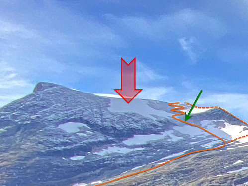 Image #15: An image of Mount Alnestinden as seen from Stigebotnen Valley on October 10th. The orange line indicates the commonly used route up to the summit of Mount Alnestinden, and the dotted line in the right part of the image indicates an alternative route that may be used as long as there's no ice shelf along the ridge up there. The red arrow points at a huge snow patch from last winter season that was still there. The area of this snow patch corresponds to the area of the avalanche that took place a little less than two weeks later. The green arrow marks a spot at which I personally triggered an avalanche on December 30th 2018.