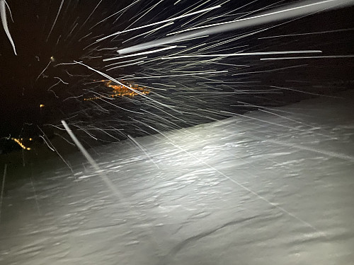 Image #18: As I embarked upon my descent from the mountain, it had started snowing.