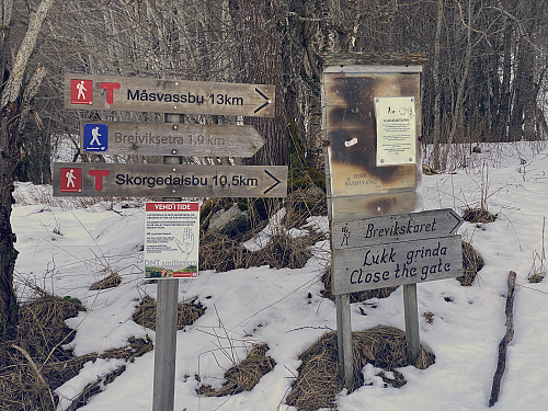 Image #2: A sign down by Breivika parking lot, pointing out the trail to a number of locations.