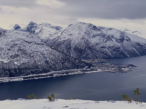 Image #12: View from Haukarhammaren towards the town of Åndalsnes. Notice that from this elevation, even the mountains of Bispen [i.e."The Bishop"], Kongen ["The King"] and Dronninga ["The Queen"] may be seen.