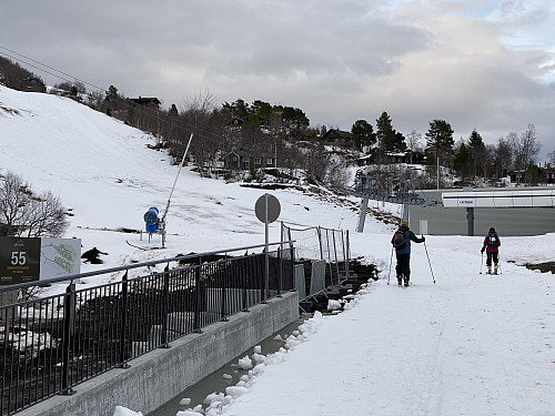 Image #2: My son and my daughter on the bridge across Fursetelva River. Snow was scarce on this day, and so the ski lift was closed.