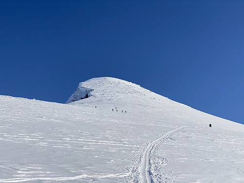 Image #8: Approaching the summit of the mountain. Notice the large ice/snow shelves that have formed on the east side of the summit.