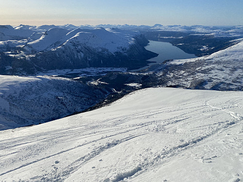 Image #13: Skiing down the slopes towards Kvidalen Valley.