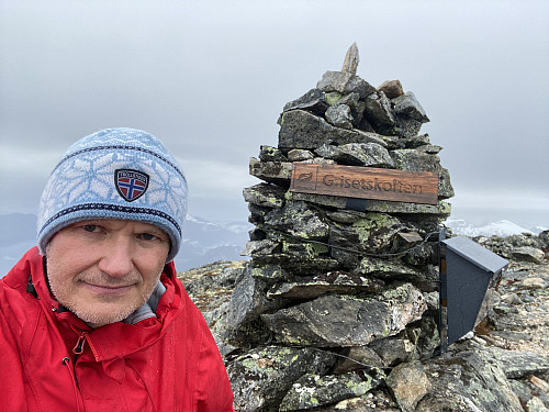 Image #10: The cairn on Mount Grisetskolten. The cairn actually hasn't been built on the highest point of the mountain, but rather on a viewpoint that offers a splendid view of the fjord called Romsdalsfjorden.