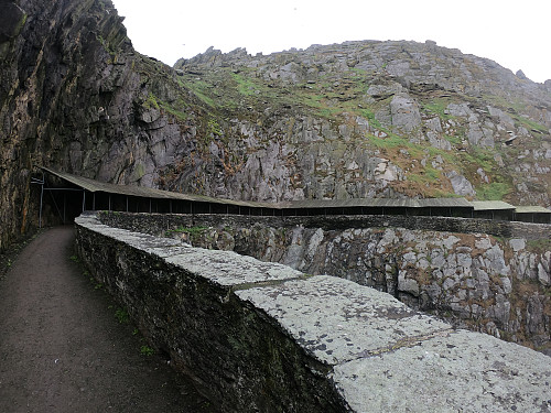 Protective roof over a part of the modern path leading from Blind Man's Cove to the start of the medieval stairs.