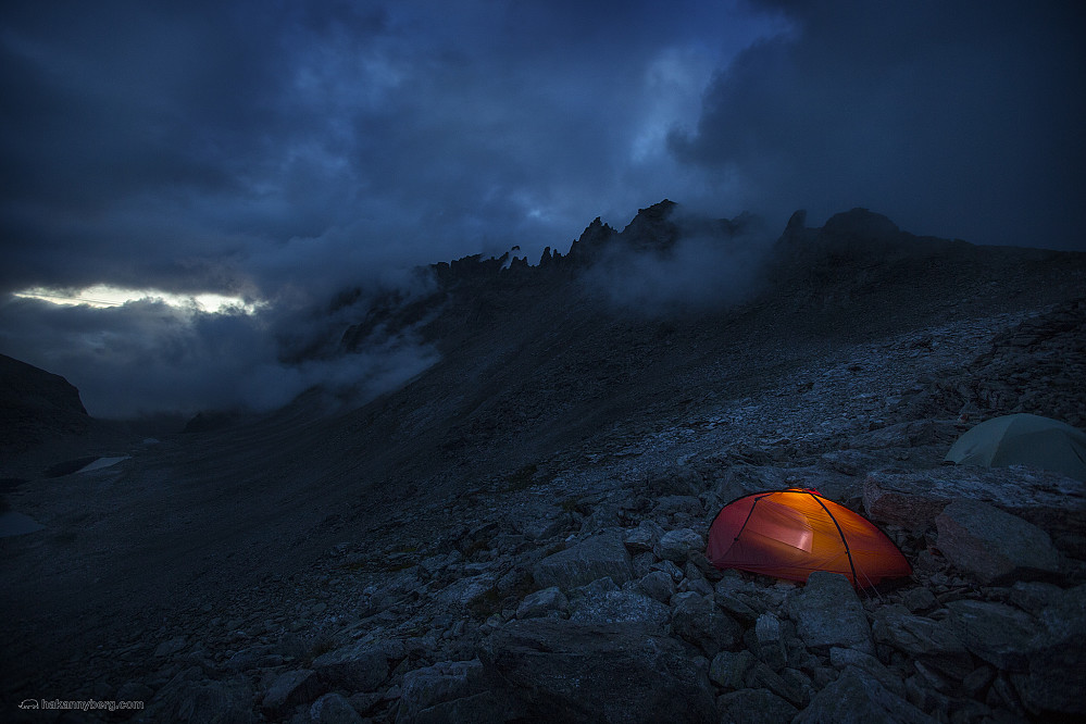 Spending the night at Frokostplassen just below Stabbeskaret. The mountain range hidden in the clouds are the Trolltindane. And just on the other side of those jagged peaks and pinnacles; the Troll Wall.