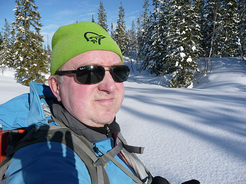 Mannen oppå skia