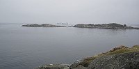 Utsikt nordover, der båtene til Mongstad venter på å få legge til.