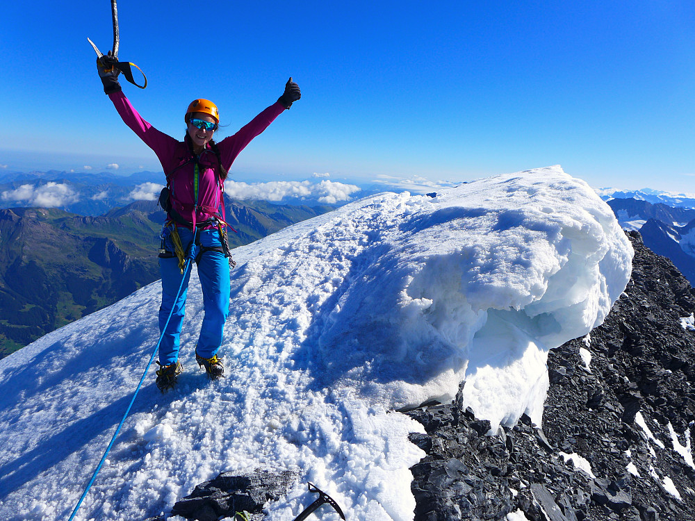 A rather excited lady on the relatively unexciting summit of the Eiger